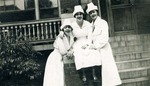 Nursing Students on Front Steps of Mercy Hospital School of Nursing Building by Misericordia University